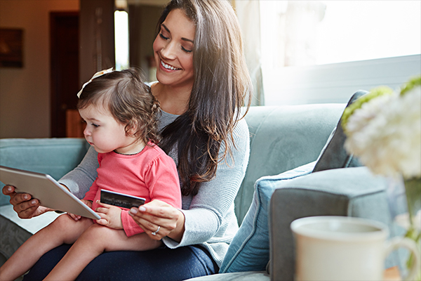 mom and daughter on laptop