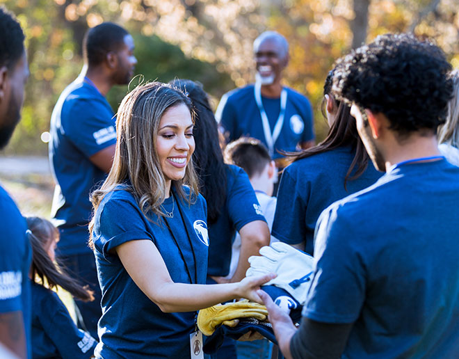 People volunteering in a park